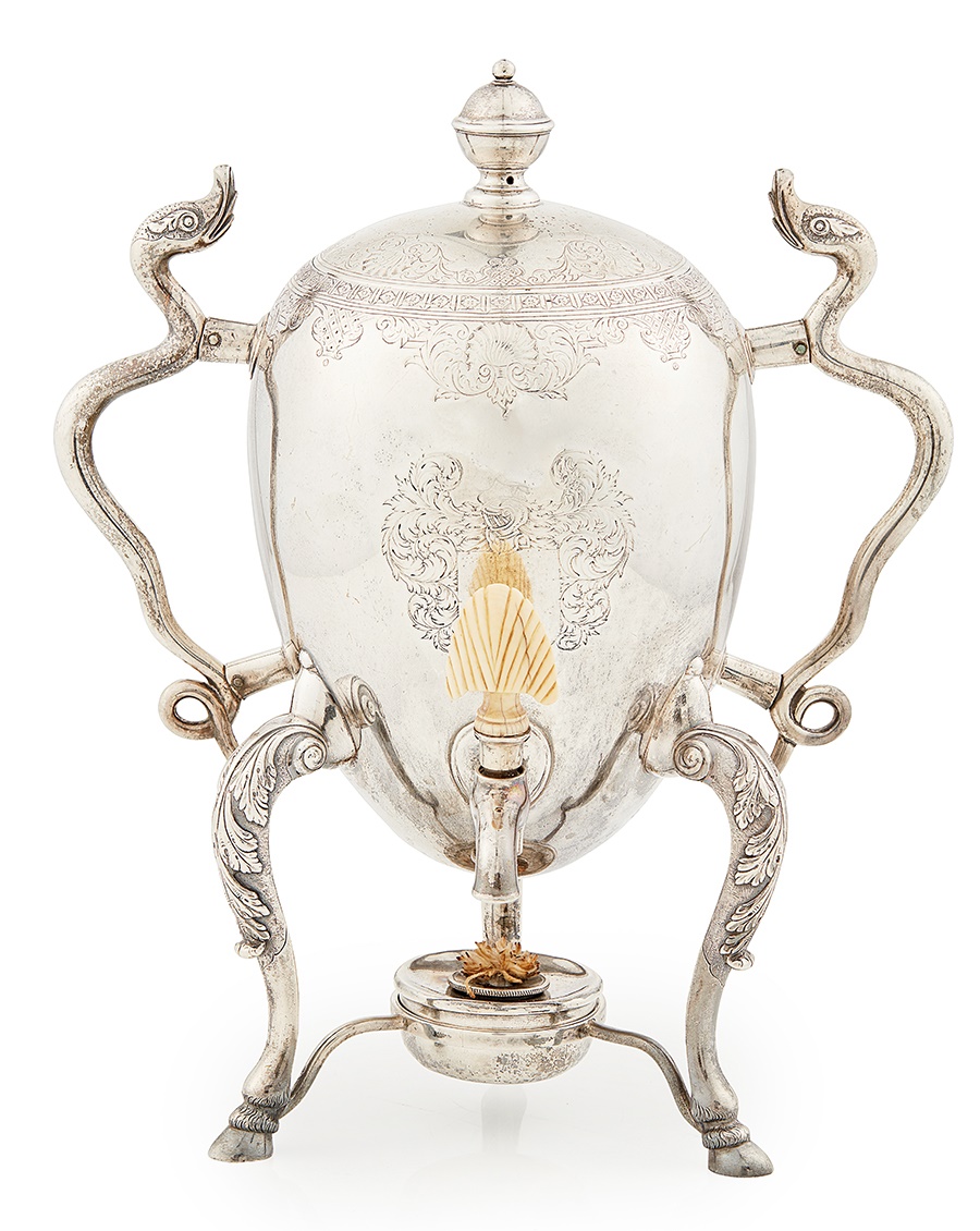 LOT 216  Y A RARE SCOTTISH GEORGE II COFFEE URN ATTRIBUTED TO JAMES KERR, EDINBURGH, CIRCA 1730 The ovoid body raised on three cabriole legs, with a chased border of shells and diaper work around the shoulder and cover, with a vacant cartouche (previously engraved), with later spirit lamp Height: 31cm, weight (all in): 52.9oz | £6,000 - £8,000 + fees